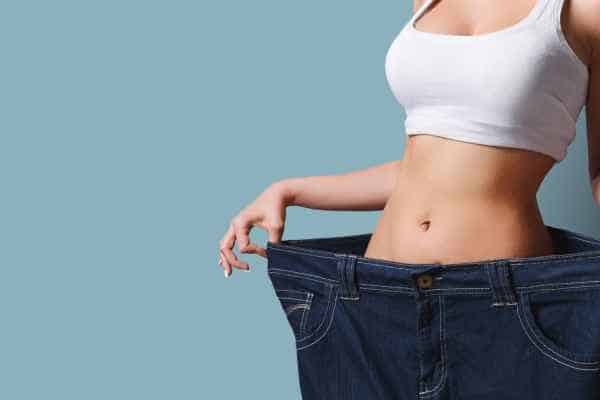 woman after fat reduction treatment Higham Ferrers