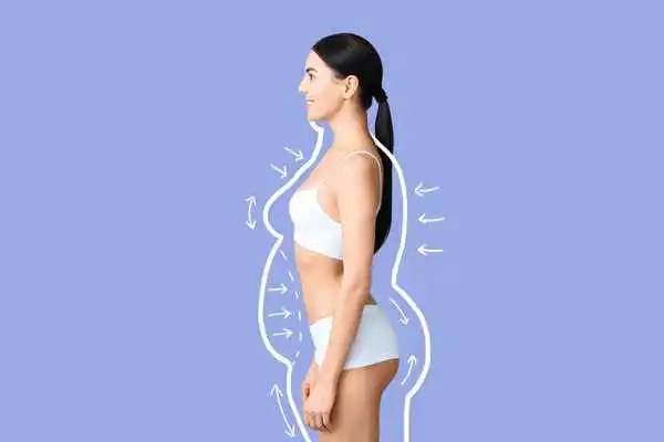image of woman experiencing fat reduction treatment Higham Ferrers